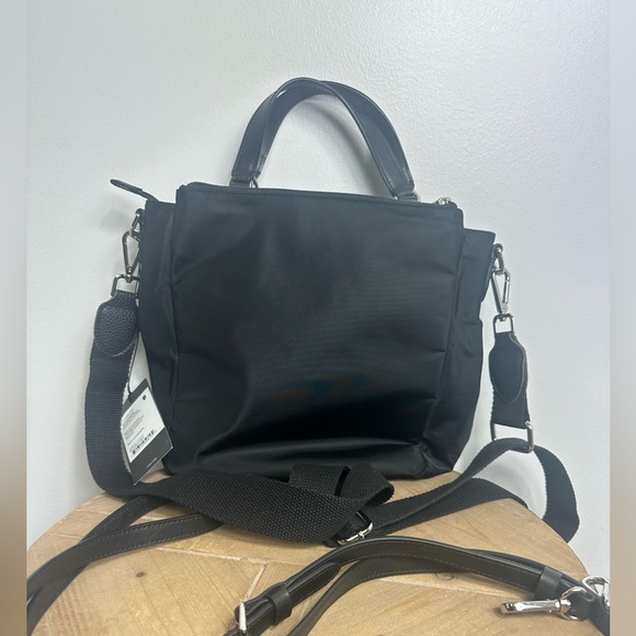 TUMI Kaylin Crossbody Nylon with leather fabric strap and leather strap. - Picture 3 of 9